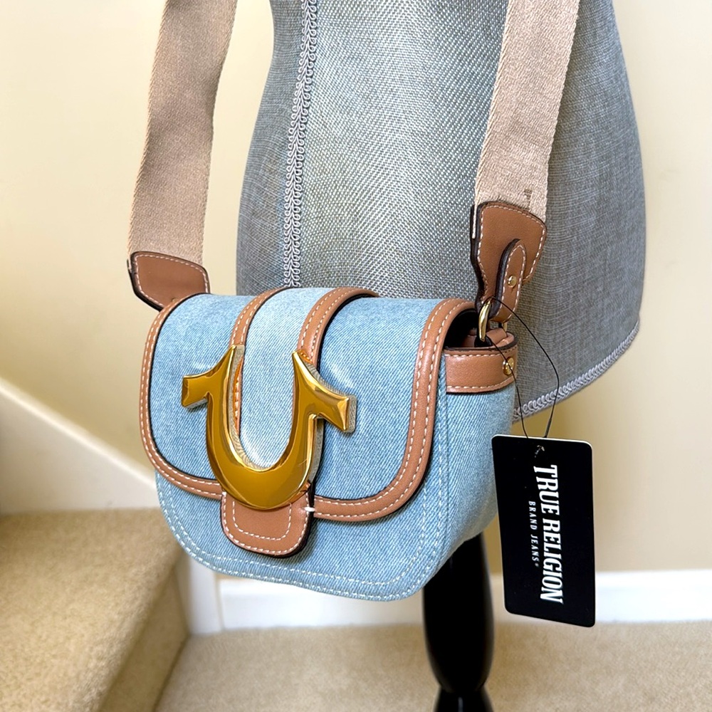 New True Religion Denim and Tan adjustable Crossbody Bag. Light blue. Gold trim.